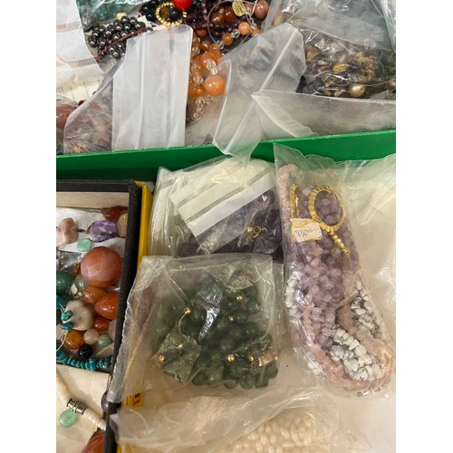 399 - Two boxes of vintage hardstone beads, necklaces etc to include moss agate, amethyst, malachite etc.