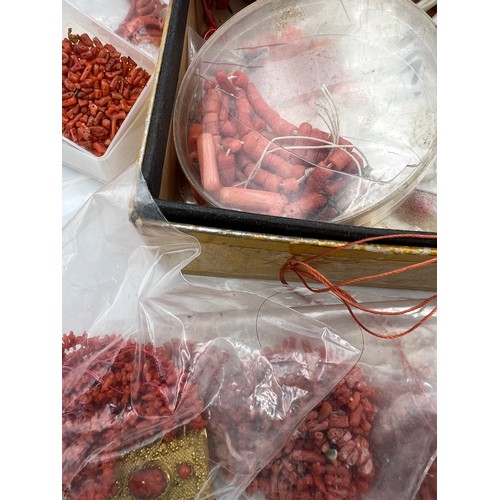 406 - A large quantity of vintage coral beads, mainly loose.