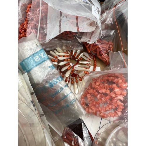 406 - A large quantity of vintage coral beads, mainly loose.