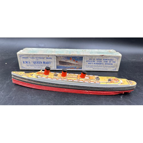 840 - Chad Valley 'Take To Pieces' model of R.M.S Queen Mary made up of twelve removable decks along with ... 