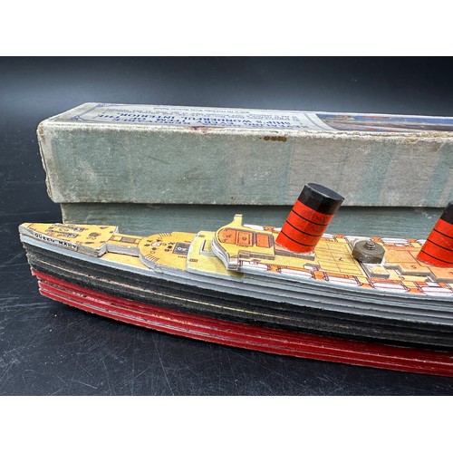 840 - Chad Valley 'Take To Pieces' model of R.M.S Queen Mary made up of twelve removable decks along with ... 