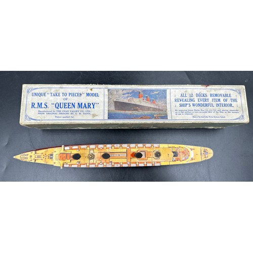 840 - Chad Valley 'Take To Pieces' model of R.M.S Queen Mary made up of twelve removable decks along with ... 