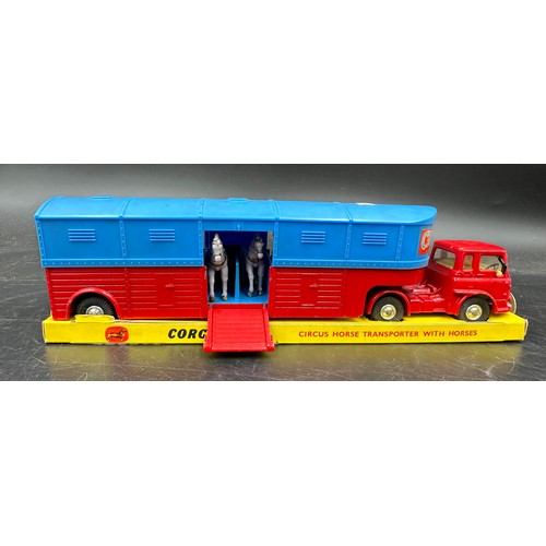 843 - Two Corgi toys circus horse transporter No. 1130 one with original box. Complete with 6 horses per t... 