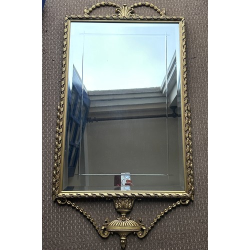 1012 - A Reflectwell heavy gilt effect period style mirror. 107 h x 57cm w.