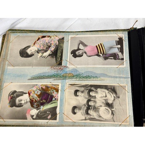 768 - An Oriental Lacquer Postcard Album containing Japanese and Chinese postcards of topographical views ... 