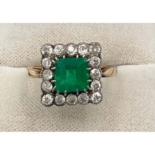 345 - A square cut emerald and diamond ring set in unmarked yellow and white metal. Head size approximatel... 