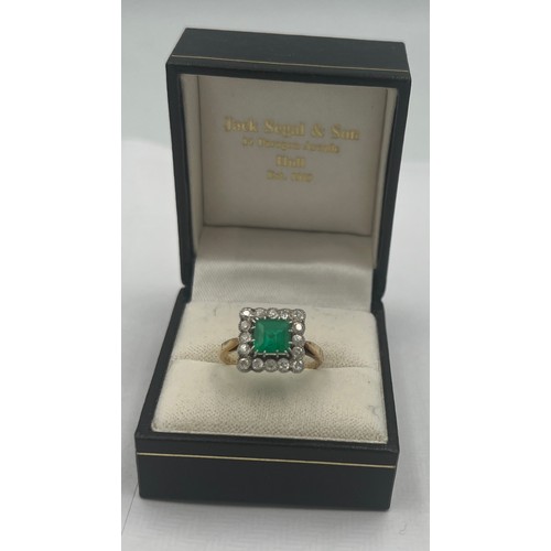 345 - A square cut emerald and diamond ring set in unmarked yellow and white metal. Head size approximatel... 