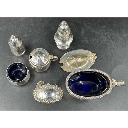 648 - Various silver to include a cruet set, salt, mustard and pepperette, Birmingham 1960, maker Walker &... 