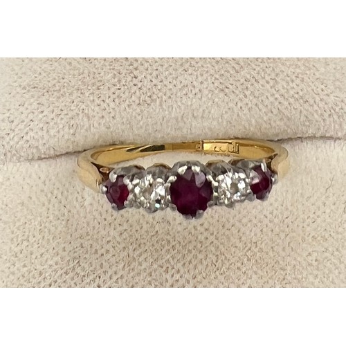 337 - An 18 carat and platinum ring set with diamonds and rubies. Size J/K. Weight 2.3gm.