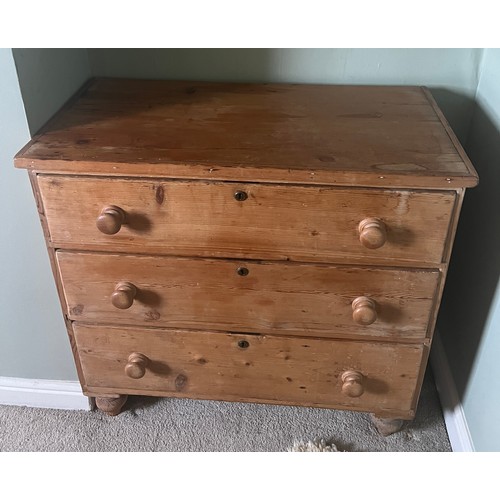 3 - A 19thC pine chest of three graduating drawers with wooden knobs. 91cm w x 46cm d x 88cm h.