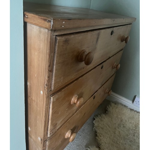 3 - A 19thC pine chest of three graduating drawers with wooden knobs. 91cm w x 46cm d x 88cm h.