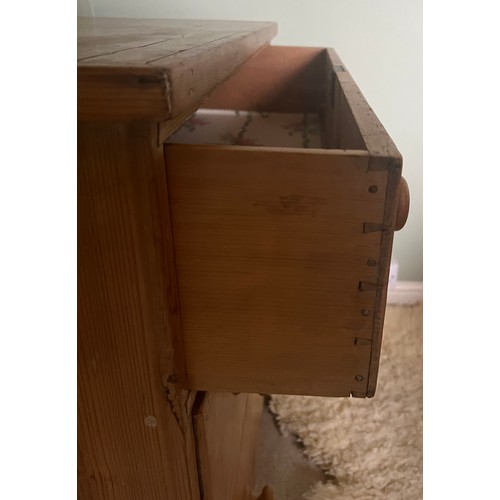 3 - A 19thC pine chest of three graduating drawers with wooden knobs. 91cm w x 46cm d x 88cm h.