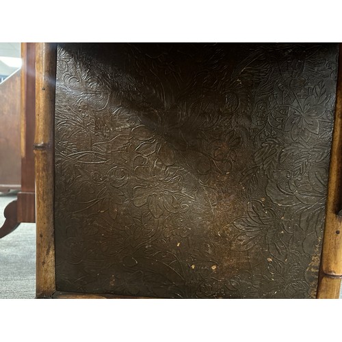 99 - A 19thC bamboo and lacquer kneehole desk with brass drop handles. 90cm w x 51cm d x 76cm h.