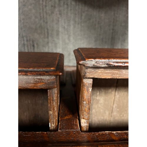 81 - Small oak chest with central door flanked by dummy drawers with others beneath. 63cm w x 44cm d x 64... 