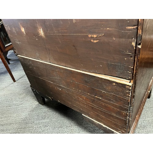 81 - Small oak chest with central door flanked by dummy drawers with others beneath. 63cm w x 44cm d x 64... 