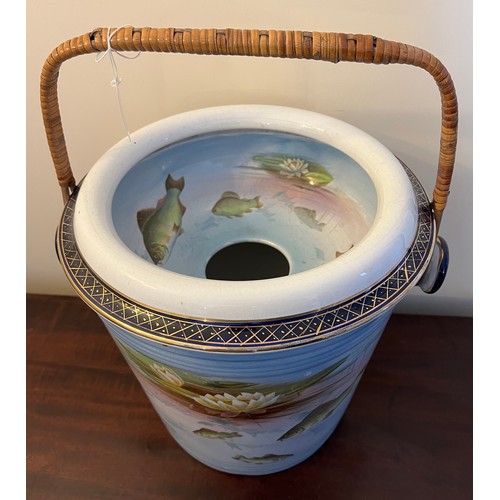 267 - A Winton Grimwades transfer printed slop bucket with fish and waterlily design with wicker handle. 3... 