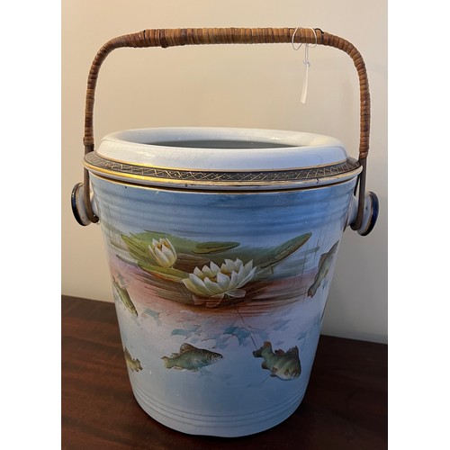 267 - A Winton Grimwades transfer printed slop bucket with fish and waterlily design with wicker handle. 3... 