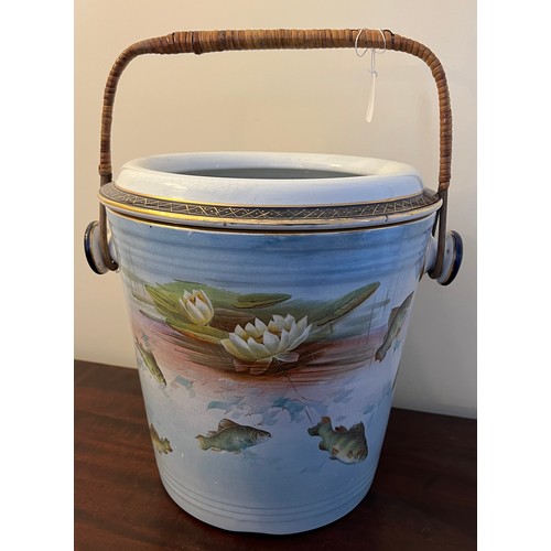 267 - A Winton Grimwades transfer printed slop bucket with fish and waterlily design with wicker handle. 3... 