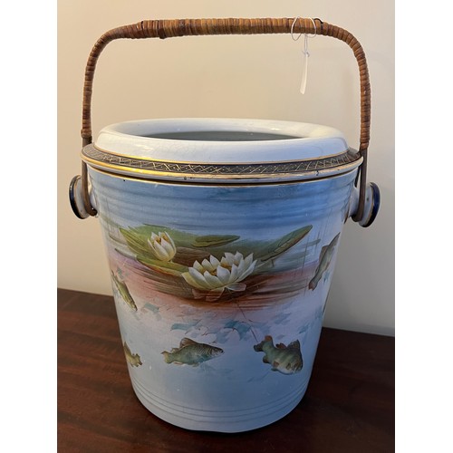 267 - A Winton Grimwades transfer printed slop bucket with fish and waterlily design with wicker handle. 3... 