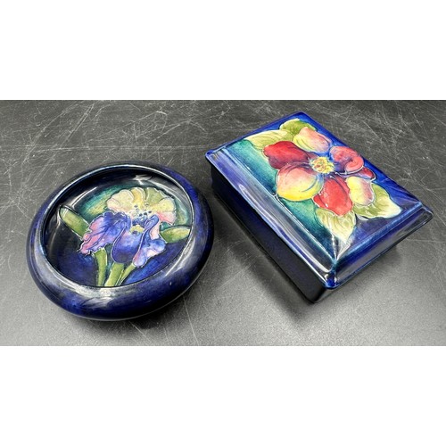 263 - A Moorcroft clematis trinket box 12x 9cm and an Iris pattern shallow bowl 11cm d.