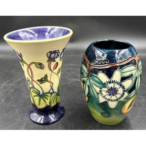 256 - Two small Moorcroft vases, comprising Hepatica, dated 1999, approx 16cm h and 'Passion Flower', date... 