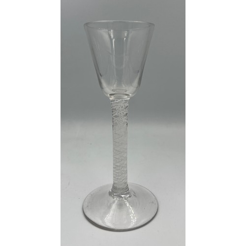 275 - A Georgian opaque air twist cordial glass 16cm h.