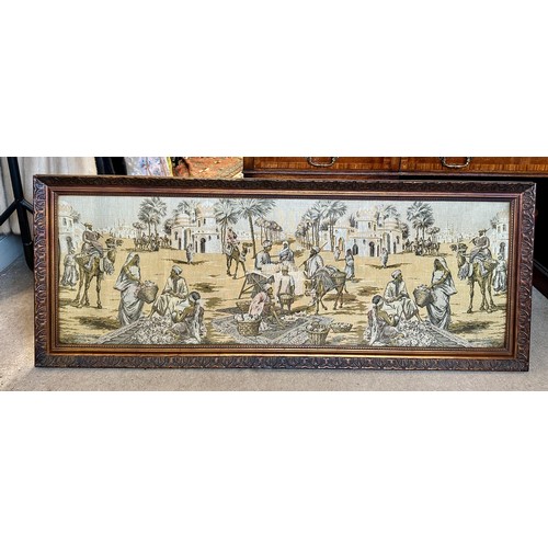 719 - A large early 19thC machine made tapestry-style picture of a Middle Eastern market/street scene in a... 