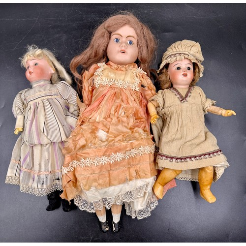 1130 - Three bisque headed dolls to include one with the head impressed 'P.R / S.F.B.J. / 60 / PARIS /8/0' ... 