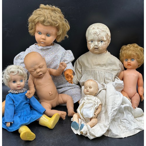 1122 - A collection of celluloid dolls, tallest 77cms long together with a Jesmar baby doll.