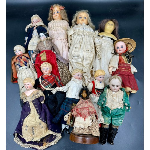 1123 - A collection of various 19thC/20thC dolls to include 4 wax dolls, 7 with bisque heads to include a 1... 