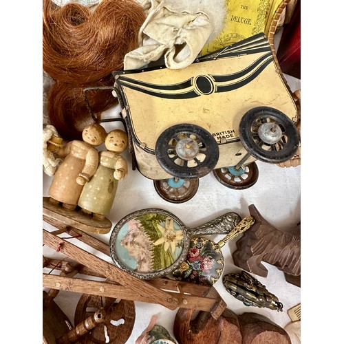 1125 - A mixture of items to include vintage doll's house accessories, tin plate pram and bucket, handmaid ... 