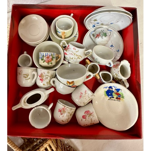 1125 - A mixture of items to include vintage doll's house accessories, tin plate pram and bucket, handmaid ... 