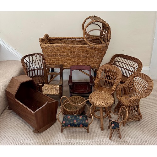 1126 - Various 19thC and 20thC toy wicker and wood items to include cradles, chairs and tables. Largest cra... 