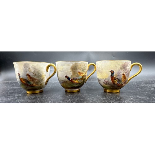 240 - A Royal Worcester coffee set painted with pheasants, by J. Stinton, all signed to include 6 x cups 5... 