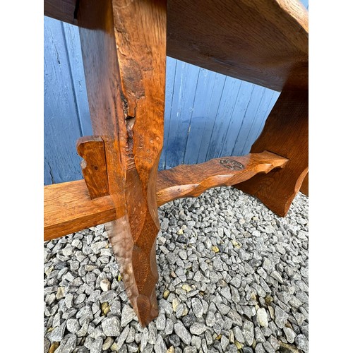 46 - A pair of oak trestle type benches/stools with rectangular tops on shaped ends joined by stretchers,... 