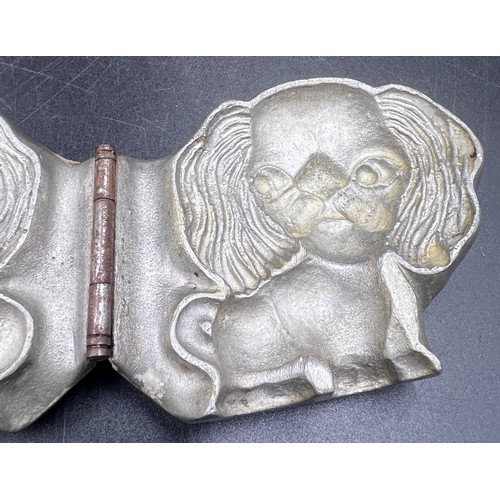 1264 - Three marzipan moulds of a a pig, an elephant and an Anton Reiche dog. Approx. 8 x 7cm.