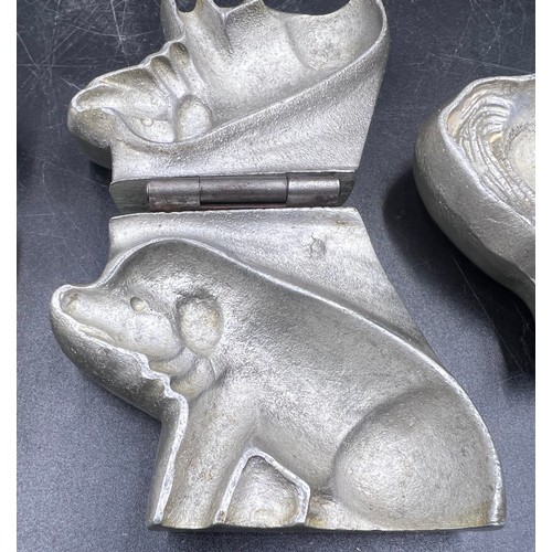 1264 - Three marzipan moulds of a a pig, an elephant and an Anton Reiche dog. Approx. 8 x 7cm.