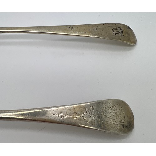 932 - Two silver tablespoons, both bottom marked, one with marks rubbed, the other London 1766. Maker Robe... 