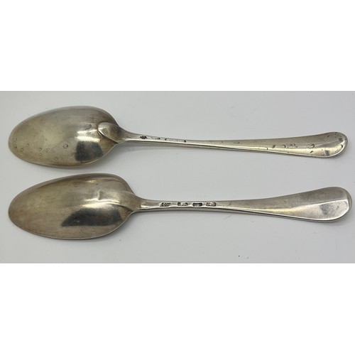 932 - Two silver tablespoons, both bottom marked, one with marks rubbed, the other London 1766. Maker Robe... 