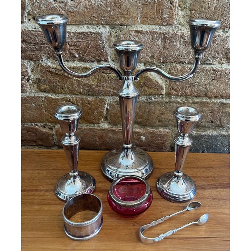 931 - Silver to include candelabra and two candlesticks with weighted bases, Birmingham  1978/79. Maker La... 