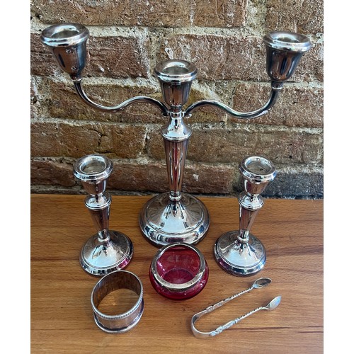 931 - Silver to include candelabra and two candlesticks with weighted bases, Birmingham  1978/79. Maker La... 