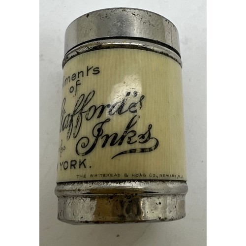 1267 - An SS Stafford’s Inks of New York advertising tin containing six dice. 3.5cm h.