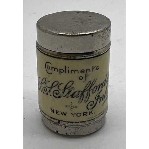 1267 - An SS Stafford’s Inks of New York advertising tin containing six dice. 3.5cm h.