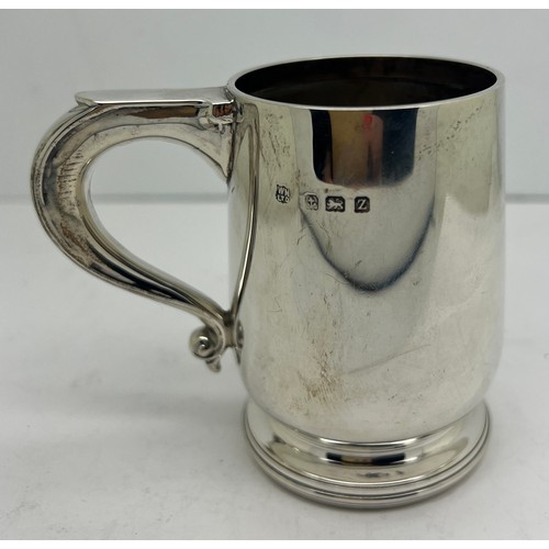 935 - A silver mug Birmingham 1924, maker William Neale & Son Ltd. Weight 92gm. 8cm h.