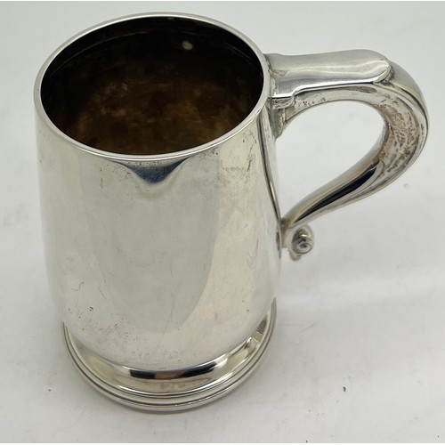 935 - A silver mug Birmingham 1924, maker William Neale & Son Ltd. Weight 92gm. 8cm h.