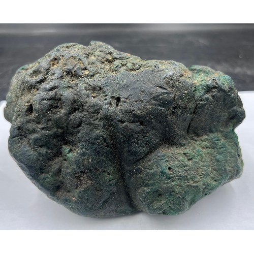 1274 - A specimen of Ambergris of dark green colour. 553gm.