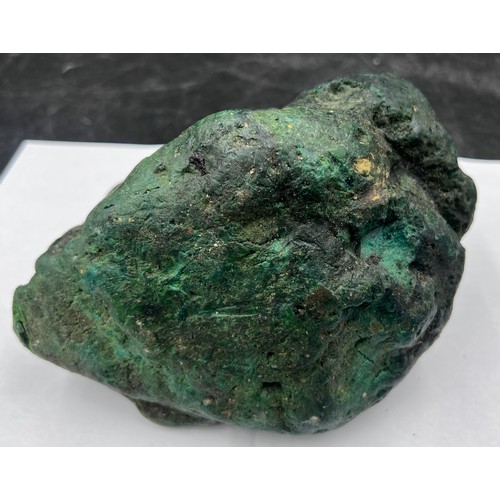 1274 - A specimen of Ambergris of dark green colour. 553gm.