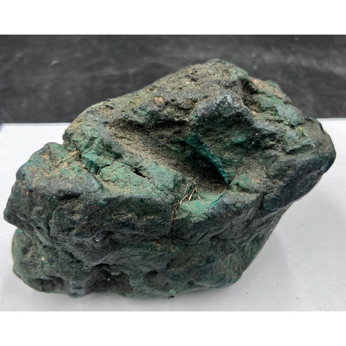 1274 - A specimen of Ambergris of dark green colour. 553gm.