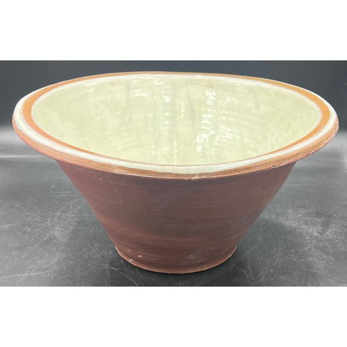 230 - A Victorian cream glazed bread mixing bowl. 42cm d.