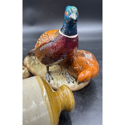 226 - Two Beswick pheasant figurines, both 20cm h together with an Earthenware flask  W.Wrangham Ltd Malto... 